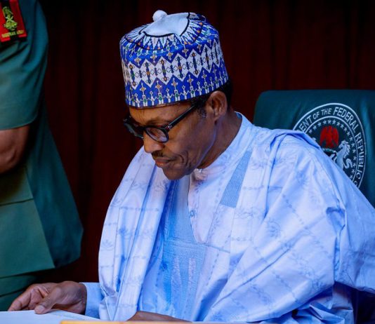 Buhari signs two new bills into law