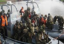 MILLITARY INVASION: JTF Kill New Mother and Her Baby During a Routine Raid in Bayelsa community (Photos)