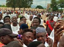 Super Eagles Star, Ahmed Musa Mobbed By Fans As He Visits Abuja Mosque For Prayers (Photos)