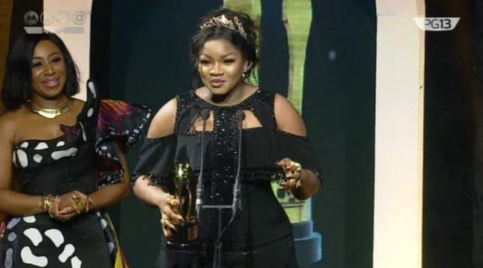 Omotola-with-her-awards-1024x569.jpg