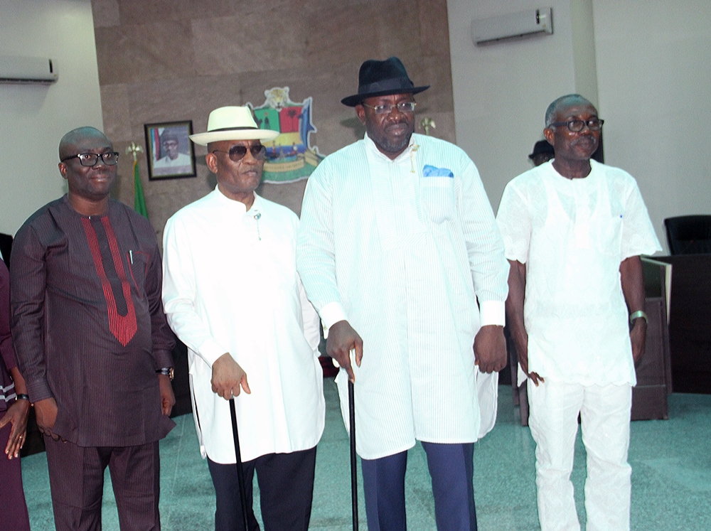 Bayelsa State Governor, Hon. Seriake Dickson (2nd R), and his Deputy, Rear Admiral Gboribiogha John Jonah Retd (2nd L), in a group photograph with the two newly sworn-in Commissioners of the State Independent Electoral Commission: Hon. Charles Emmanuel (L), and Barr. Ajoko Perediyegha, shortly after the swearing-in ceremony, at the Executive Chambers, Government House, Yenagoa.