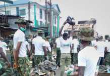 PHOTOS: Army cleans Calabar Watts Market