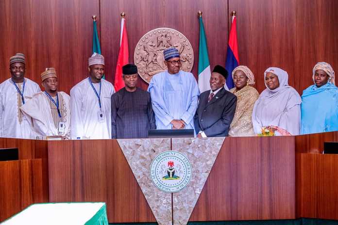 President Buhari Swears in Honourable Justice Tanko Muhammad as Chief Justice of Nigeria in State House on 24th July 2019