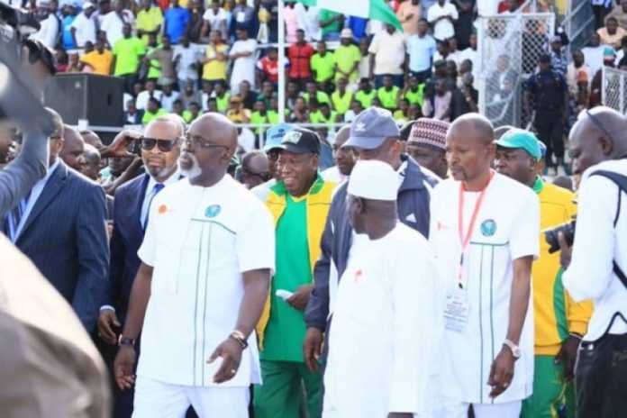 •NAN Photo shows Pinnick, with Governor Ganduje at his back, during the 2019 Aiteo Cup final on Sunday in Kaduna