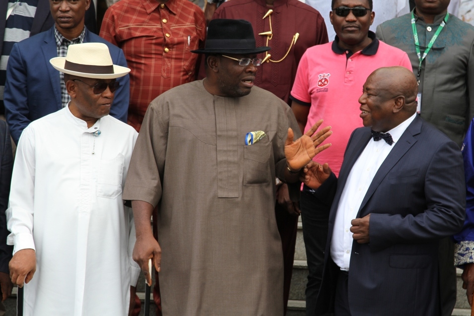 Bayelsa State Governor, Hon. Seriake Dickson (centre) explaining a point to the Acting Managing Director/Chief Executive Officer of NDDC, Prof. Nelson Brambaifa (right) during a courtesy call at Government House, Yenagoa, while the Deputy Governor, Rear Admiral Gboribiogha John Jonah retd (left) looks on
