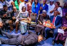 PHOTOS: Anthony Joshua prostrates to pay homage to Buhari, Presents Heavyweight Titles To President In UK