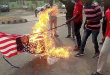 Soleimani killing: Islamic Movement protests in Abuja, burns US flag …As US warns citizens of Reconsider travelling to Nigeria