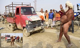 Holy man pulls a vehicle with his penis, Allahabad, India - 03 Jan 2018