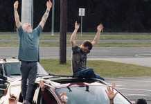 Photos of Church Service held at Florida, holding in cars as a result of the Corona Virus..