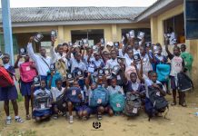 Boyloaf lists 40 students for scholarships, to build 10 ICT libraries in Bayelsa Students of the Yenaka Secondary School posing with their gifts from the Boyloaf Foundation